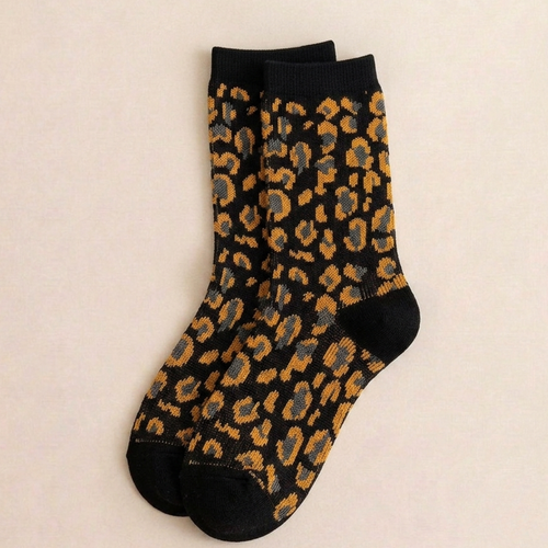 Leopard print socks in black with a tan leopard pattern, flat-lay pair.