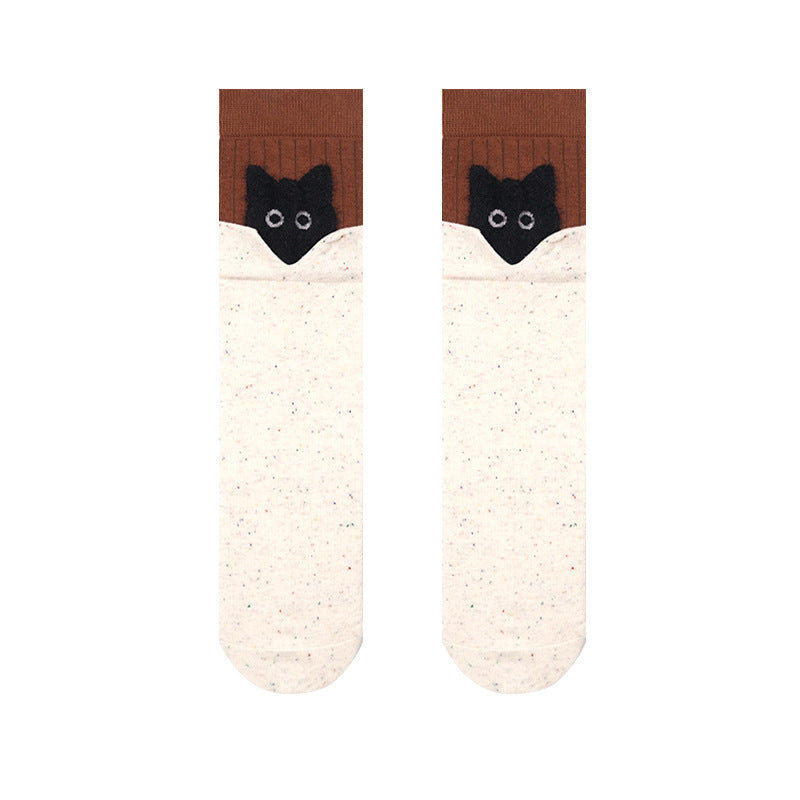 Black cat socks in ivory with a black cat peeking over a brown cuff, flat-lay pair.