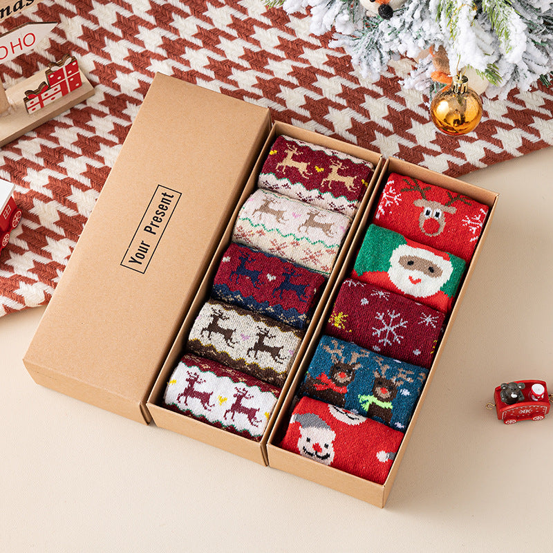 Christmas socks bulk set packaged in a kraft gift box with assorted festive designs, styled for gifting.