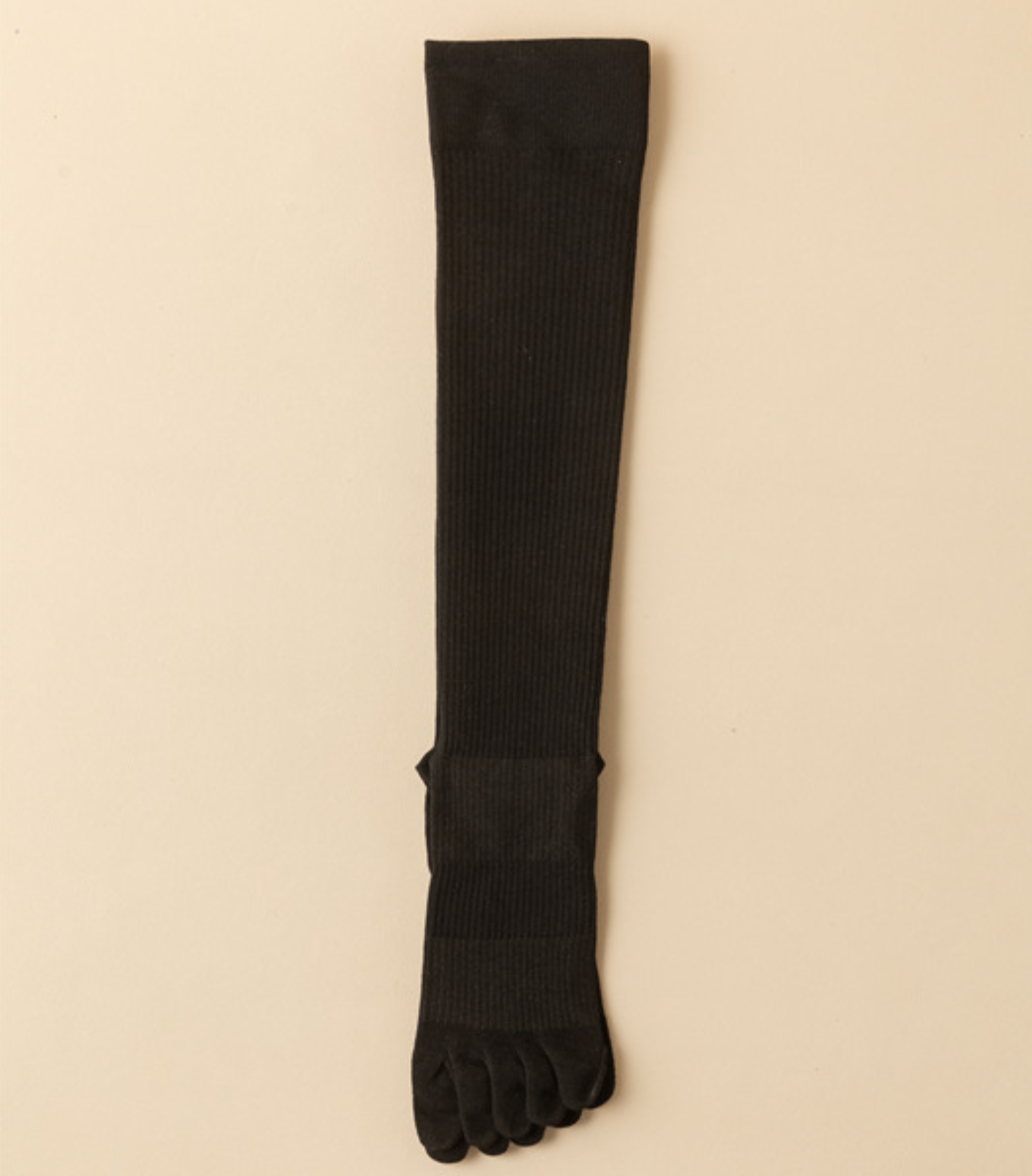 Compression toe socks in black ribbed knit, featuring a knee-high compression leg. Shown as a single flat-lay.
