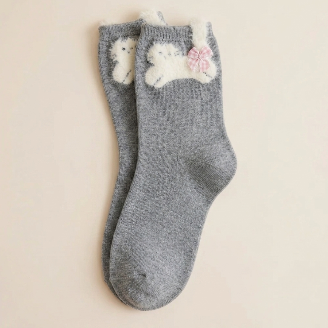 Cute cat socks in gray with a 3D cat face and ears at the cuff, single sock shown flat.