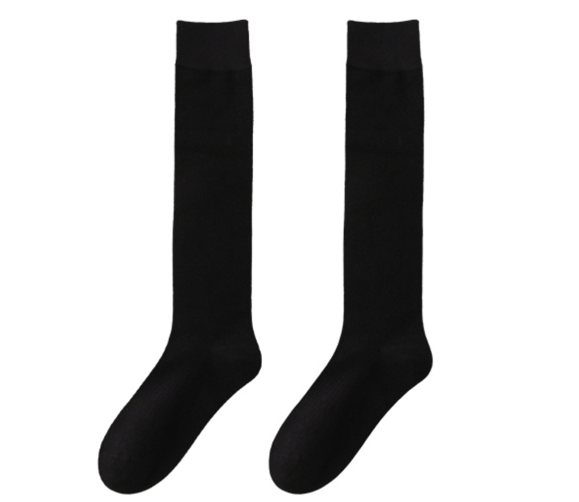 Dress socks for loafers in black ribbed fine knit, a flat-lay pair with a polished dressy finish.