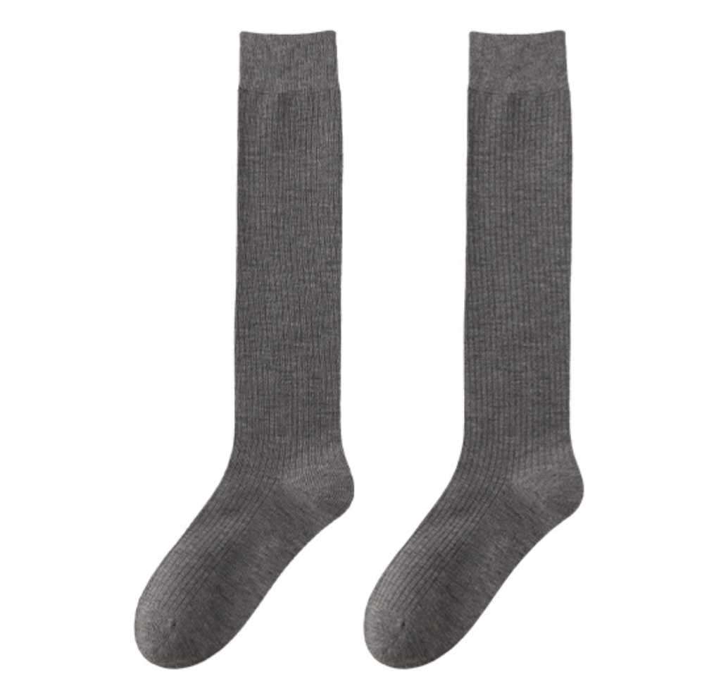 Dress socks for loafers in mid-gray ribbed knit, a flat-lay pair showing the smooth seamless toe.