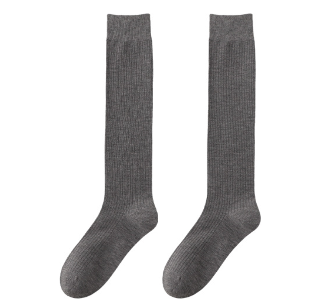 Dress socks for loafers in mid-gray ribbed knit, a flat-lay pair showing the smooth seamless toe.