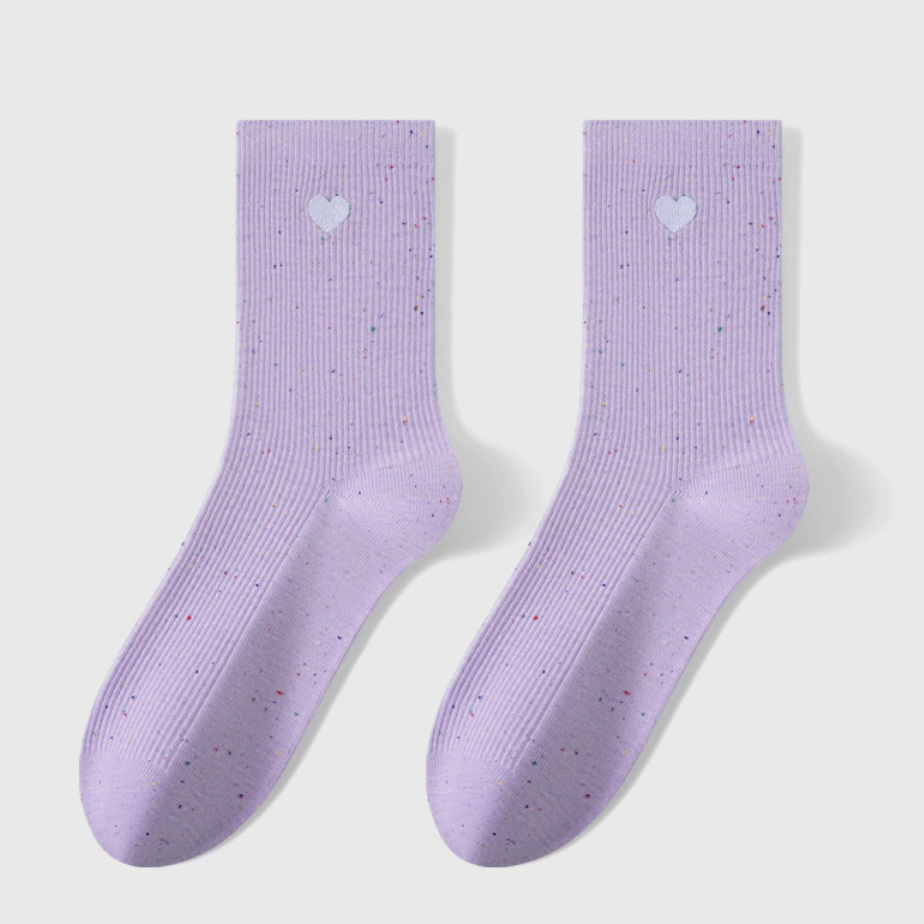 Embroidered crew socks in lavender knit, featuring a heart embroidery detail. Displayed flat as a pair on a neutral surface.