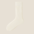 Fleece lined socks in white, a single sock shown flat to show the plush lined cuff.