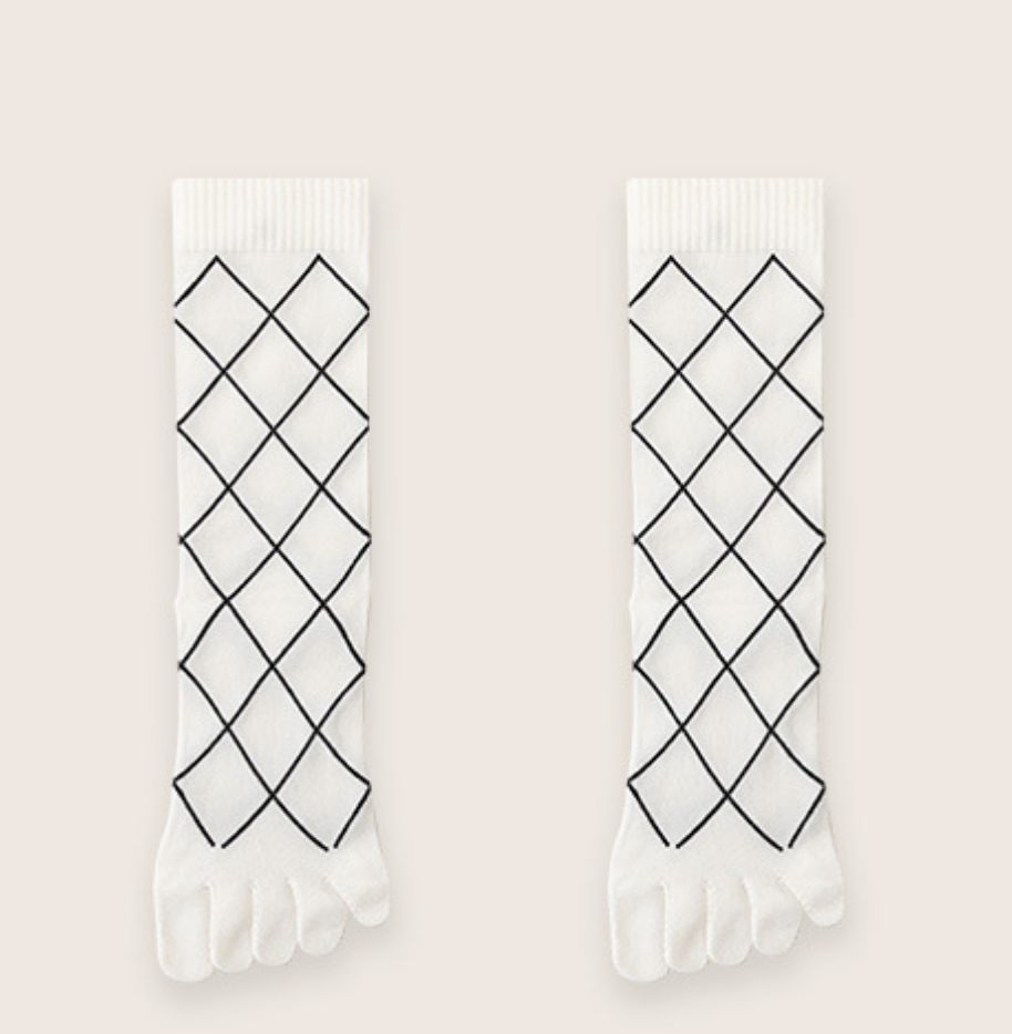 Funky toe socks in white with a black diamond lattice pattern, featuring five-toe construction. Displayed flat as a pair.