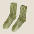 Green ruffle socks in olive green ribbed knit, flat-lay pair with a ruffle cuff.