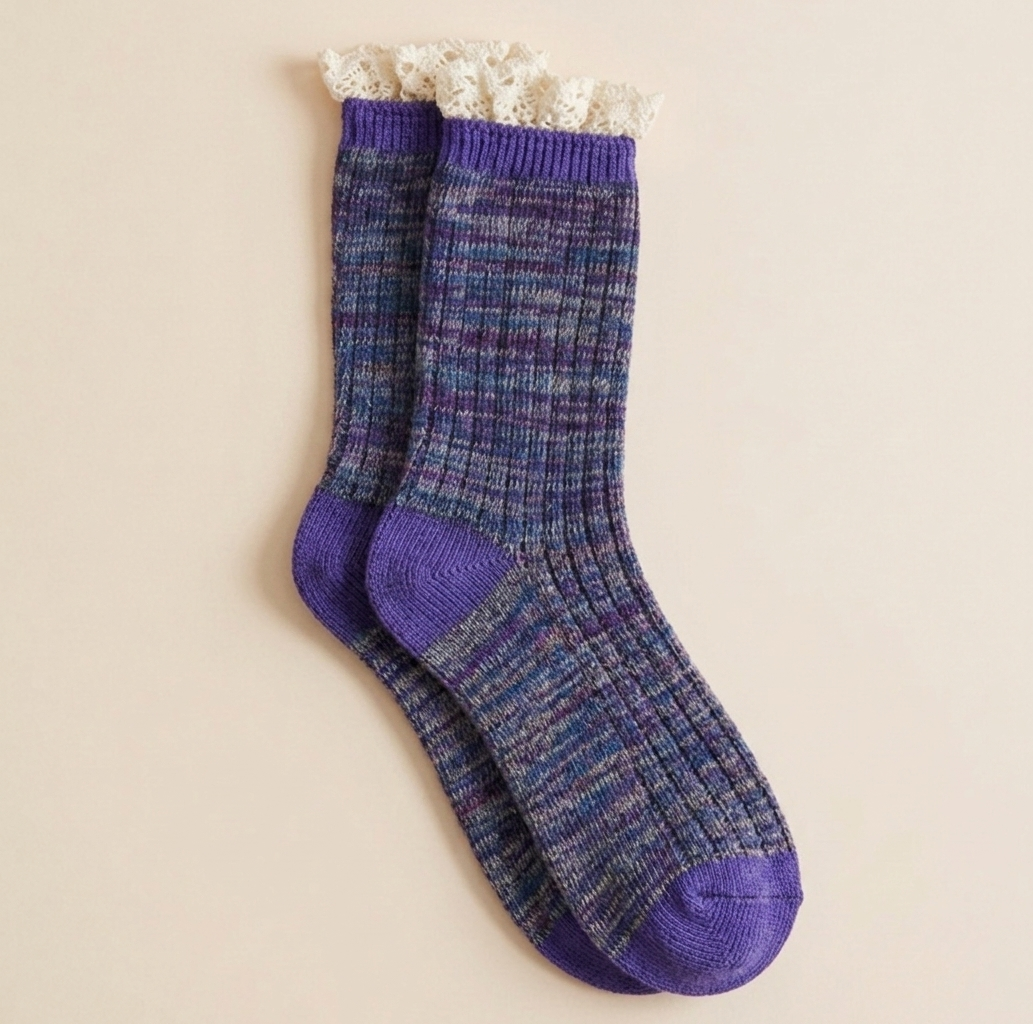 Lace boot socks in purple marled knit, featuring a white lace-trim cuff. Shown as a single flat-lay on a light backdrop.