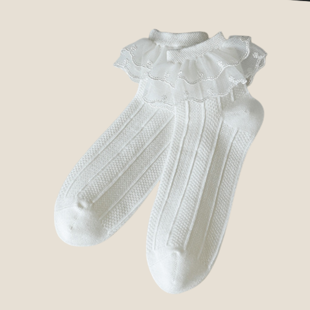 Lace ruffle socks in white with a double-layer lace ruffle top, flat-lay pair.