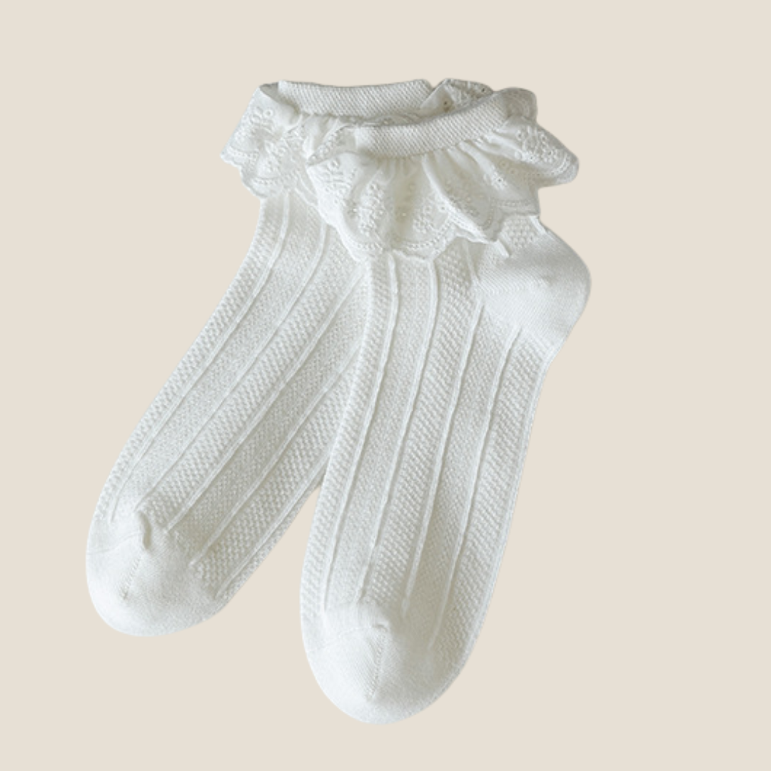 Lace ruffle socks in white with a single-layer lace ruffle, flat-lay pair.
