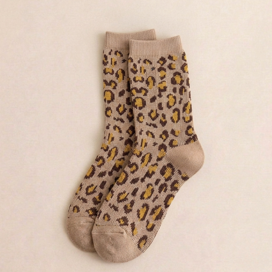 Leopard print socks in khaki with a leopard pattern, flat-lay pair.