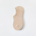 Low cut ankle socks in beige, featuring a soft low-cut body. Shown as a single flat-lay on a white backdrop.