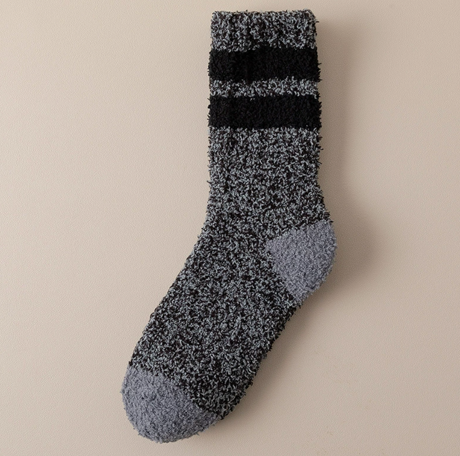 Men's cozy socks in charcoal marled knit, featuring black stripes and a grey heel. Shown flat against a neutral backdrop.