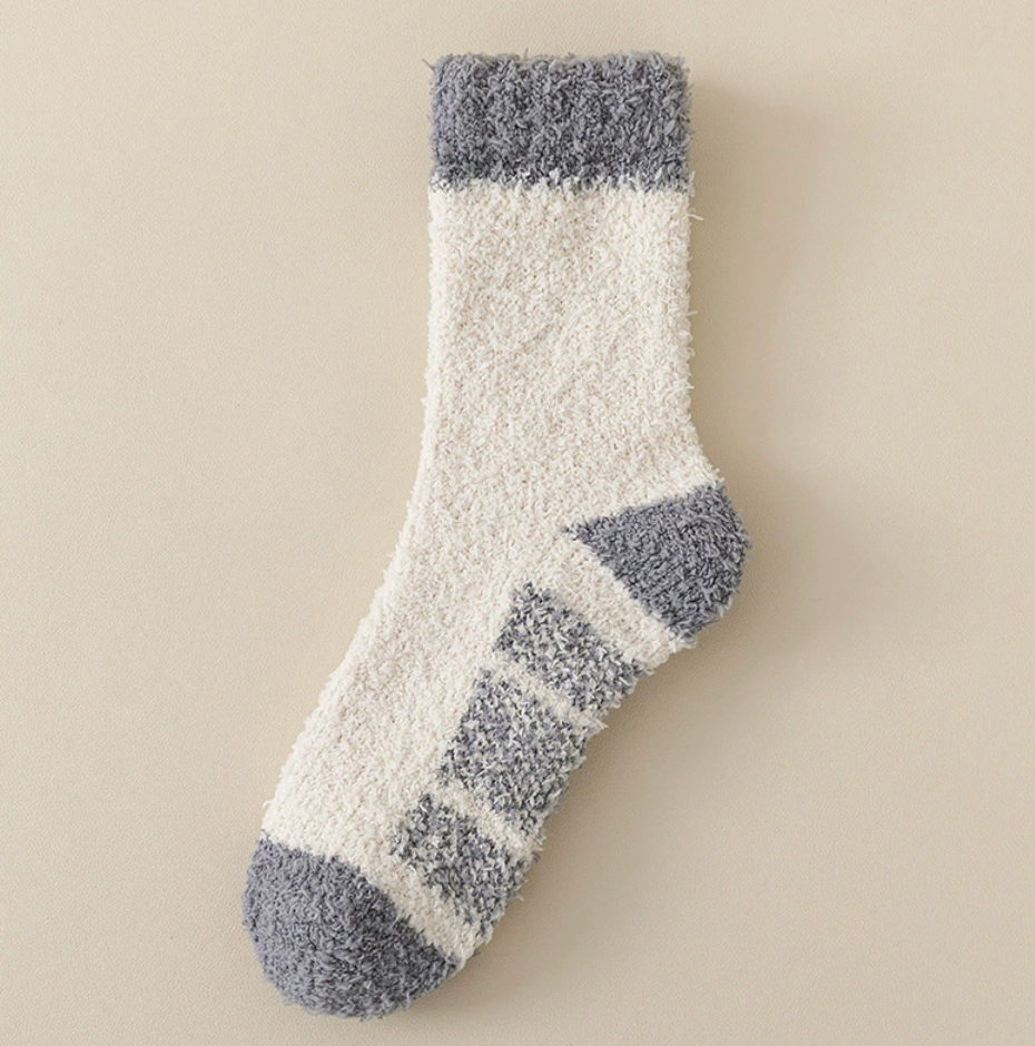 Men's fleece socks in cream plush fleece with gray heel and toe, single sock laid flat.