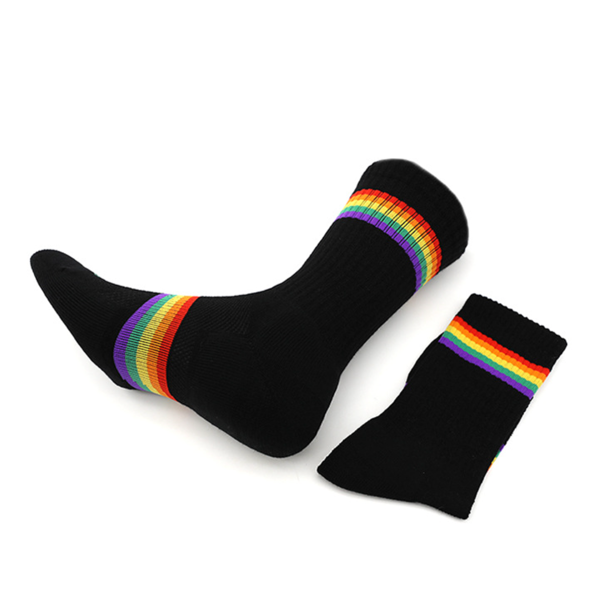 Men's rainbow merino wool quarter socks in black, featuring multicolor rainbow stripes. Laid flat as a pair on a neutral surface.