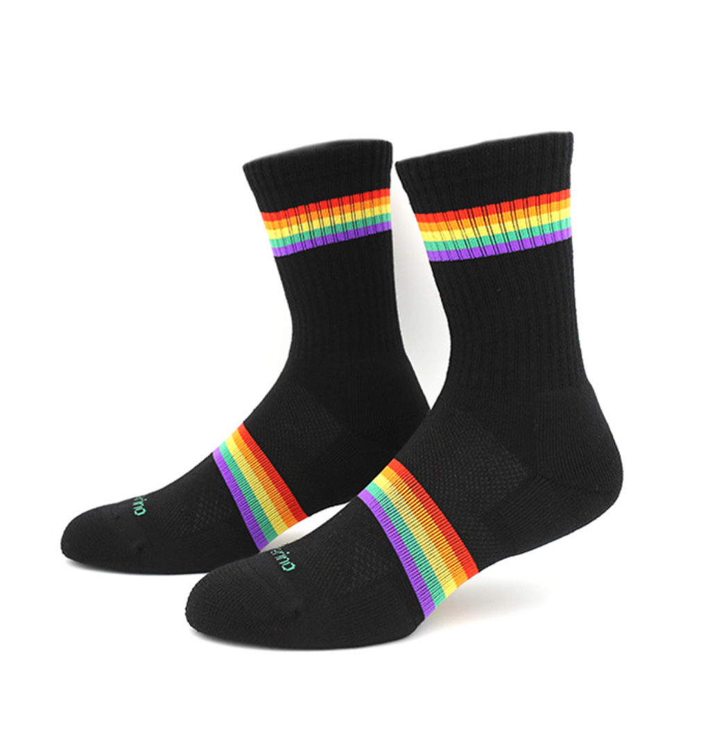 Men's rainbow merino wool quarter socks in black, featuring a bright rainbow stripe accent. Displayed as a pair on a light backdrop.