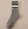 Merino wool thermal socks in heathered gray with cream stripes, a single sock shown flat.