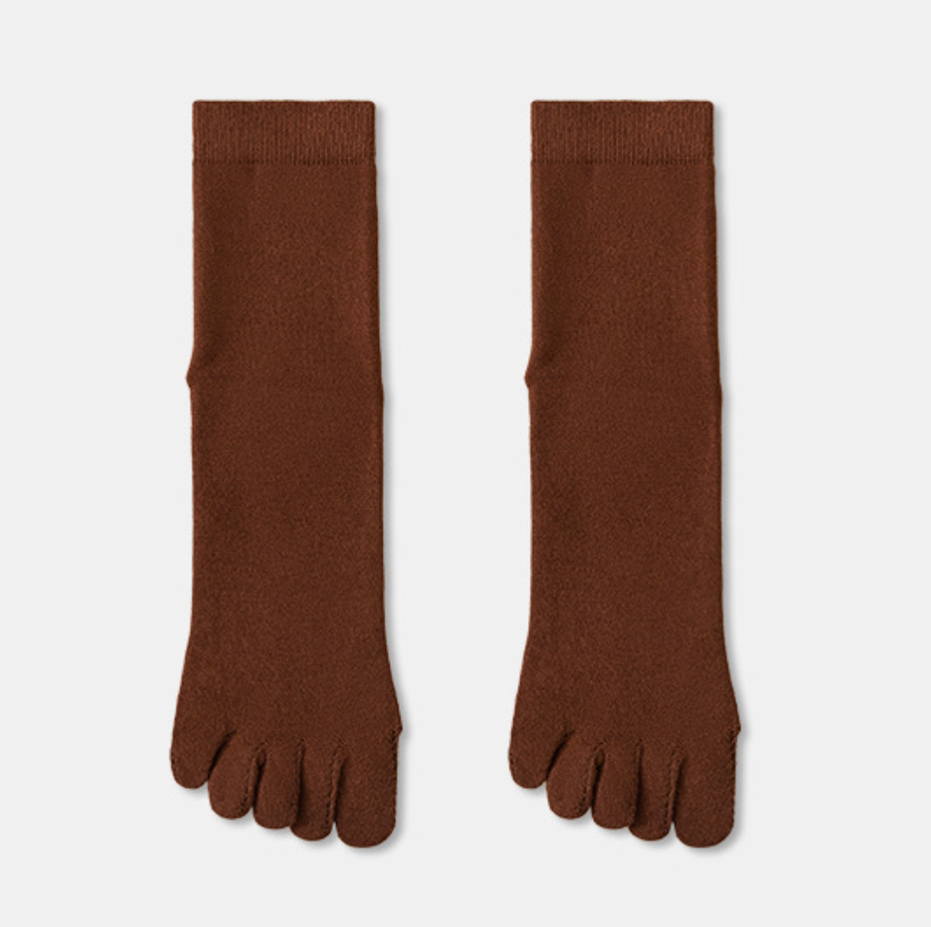 Merino wool toe socks in warm brown ribbed knit, featuring individual toe pockets. Displayed flat as a pair on a neutral surface.
