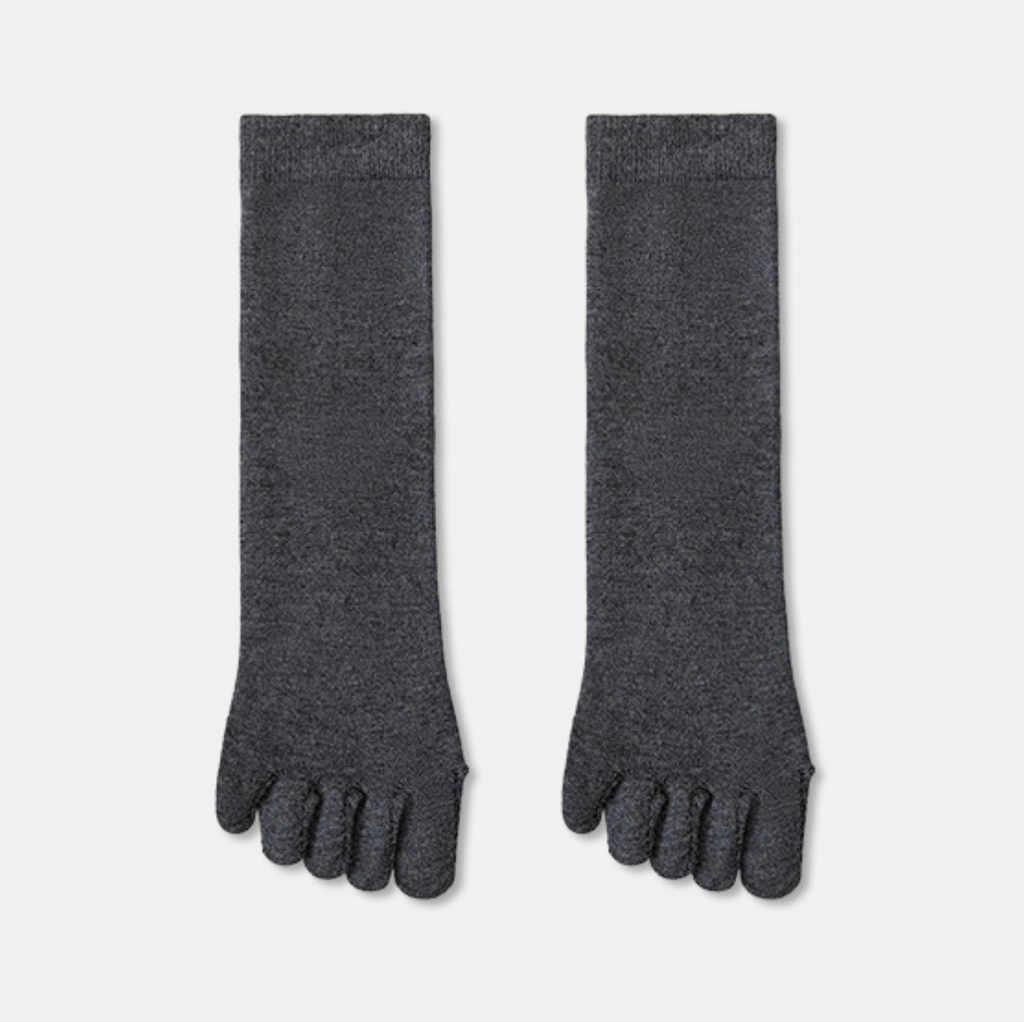 Merino wool toe socks in charcoal grey ribbed wool, featuring a snug five-toe fit. Shown flat as a pair on a light backdrop.