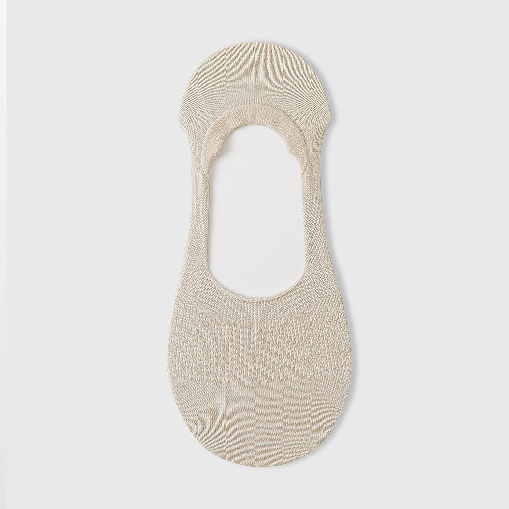 No show socks for loafers in khaki beige, a single invisible loafer sock shown flat on a gray background.