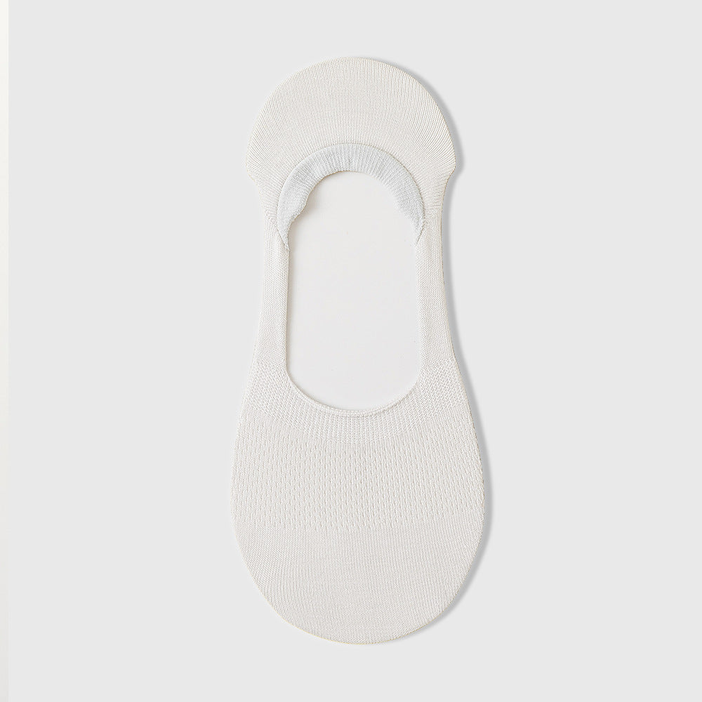No show socks for loafers in white, a single invisible low-cut sock shown flat to display the deep front cut.