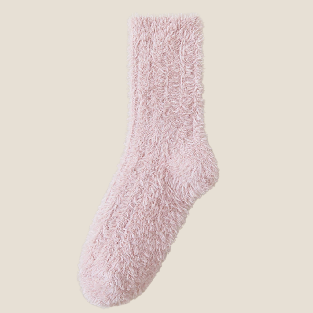 Socks for cold toes in rose pink fleece, featuring a plush cushioned toe. Laid flat against a soft neutral background.