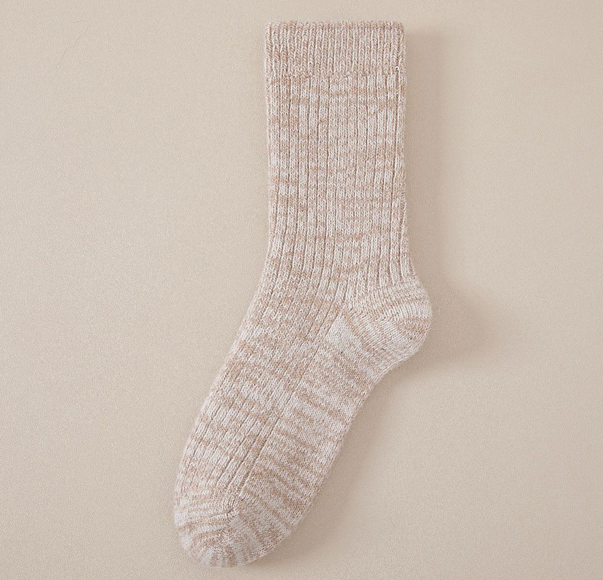 Thick boot socks in oatmeal marled wool, featuring a cushioned ribbed body. Shown flat against a neutral backdrop.