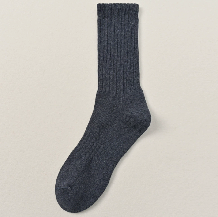 Thick socks business casual in navy grey, featuring a smooth ribbed weave. Displayed flat to highlight the dress-sock profile.
