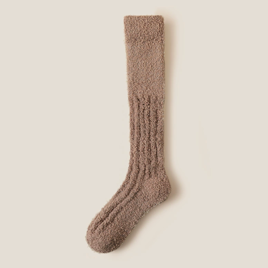 Warm knee high socks in taupe fuzzy fleece, featuring an ultra-soft texture. Displayed flat to show the plush leg.