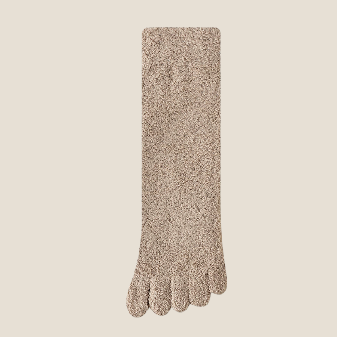 Warm toe socks in taupe fuzzy fleece, featuring cozy five-toe styling. Displayed flat to show the plush pile.
