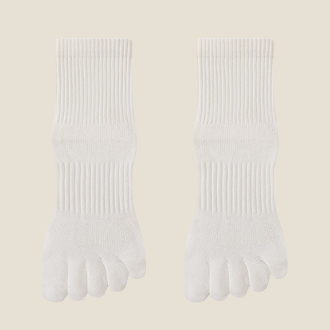 White toe socks in ribbed knit, featuring individual toe pockets. Shown as an upright flat-lay pair on a neutral surface.