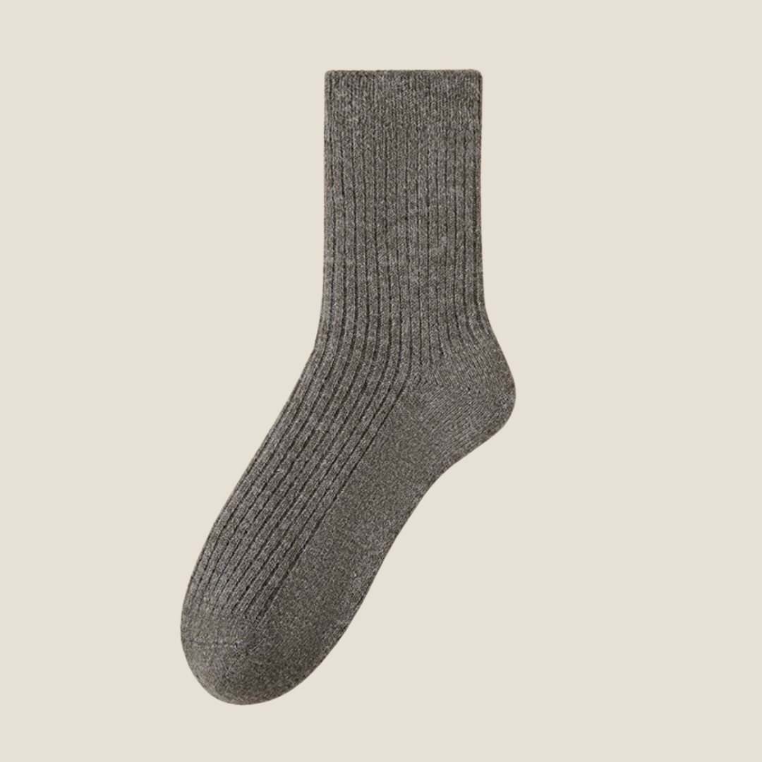 Winter socks for men in charcoal grey, featuring a chunky ribbed texture. Displayed flat to show the warm thermal body.