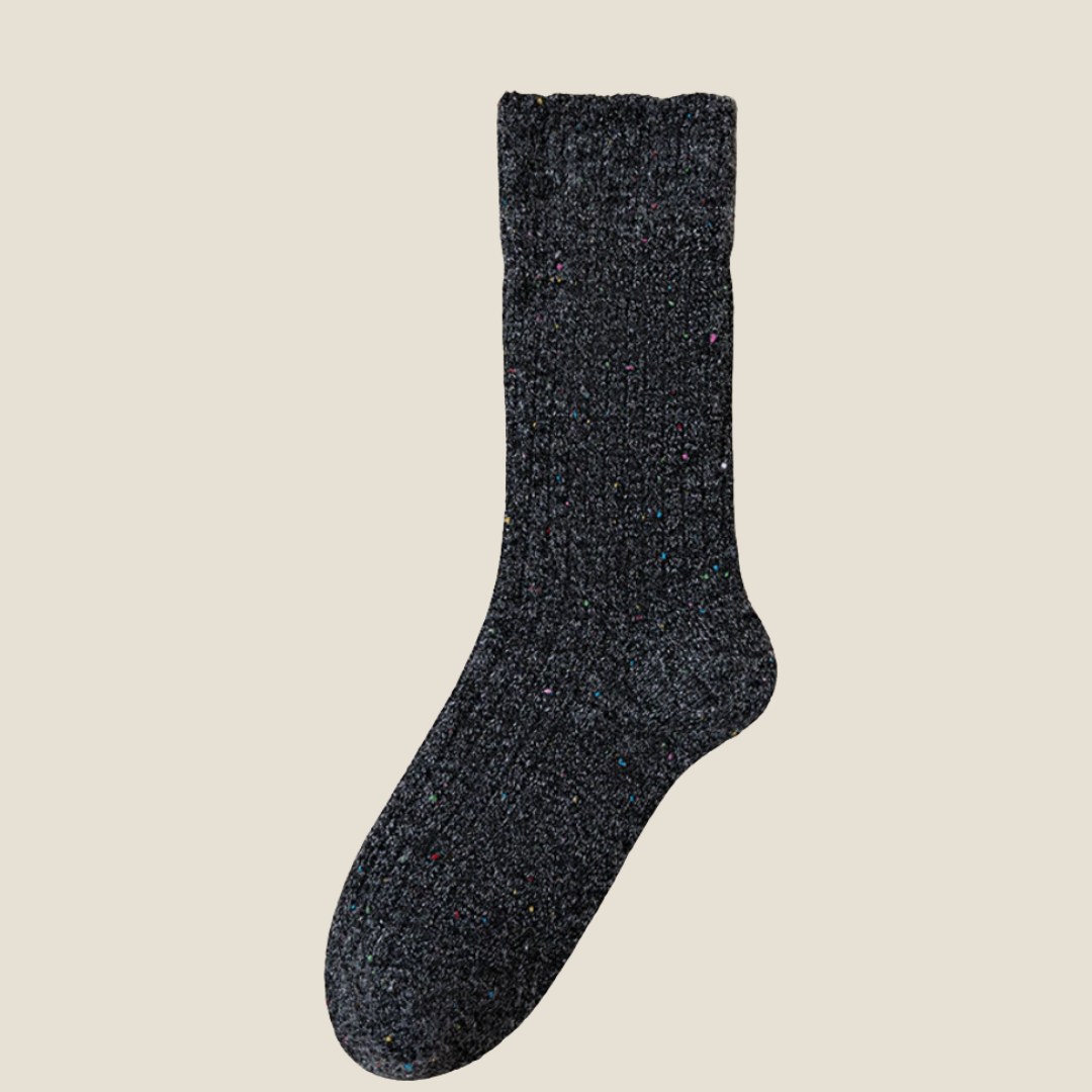 Winter socks for women in charcoal navy, featuring a marled ribbed texture. Displayed flat to highlight the cozy thermal knit.