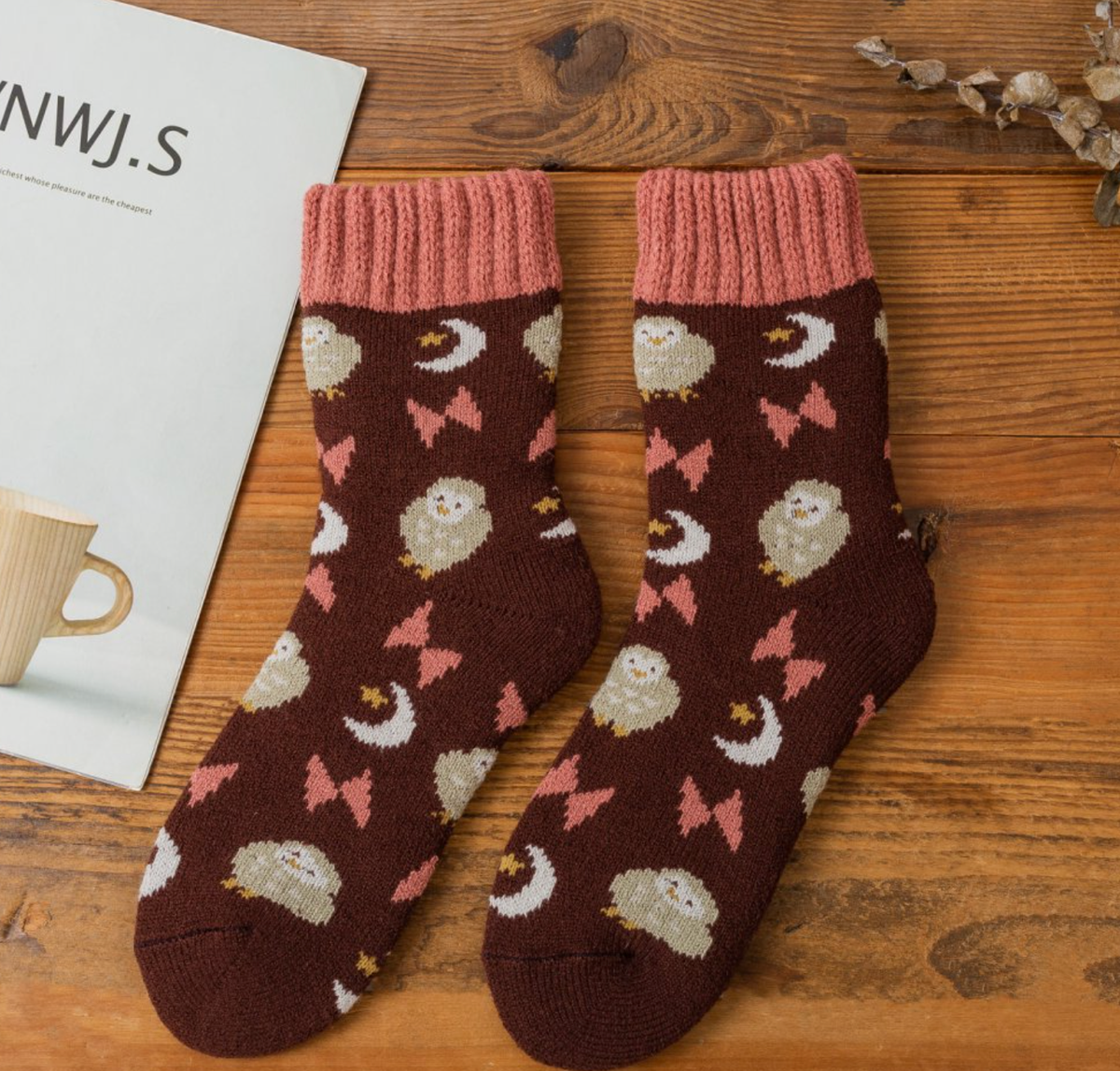 Women's thermal socks in coffee burgundy with a hedgehog and moon print, flat-lay pair.