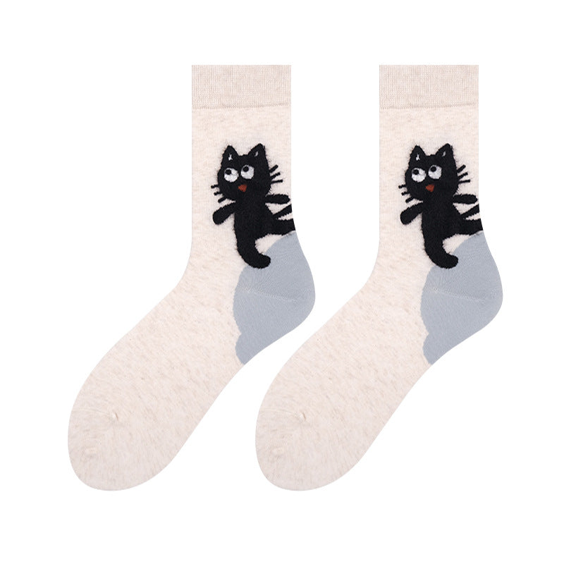 Women's cat socks in cream with a cartoon cat and blue-gray tail, flat-lay pair.