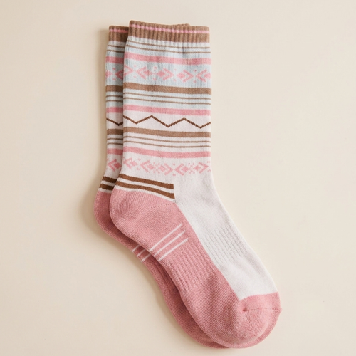 Wool boot socks in pink and cream, featuring a Nordic Fair Isle pattern. Shown as a single flat-lay on a neutral backdrop.